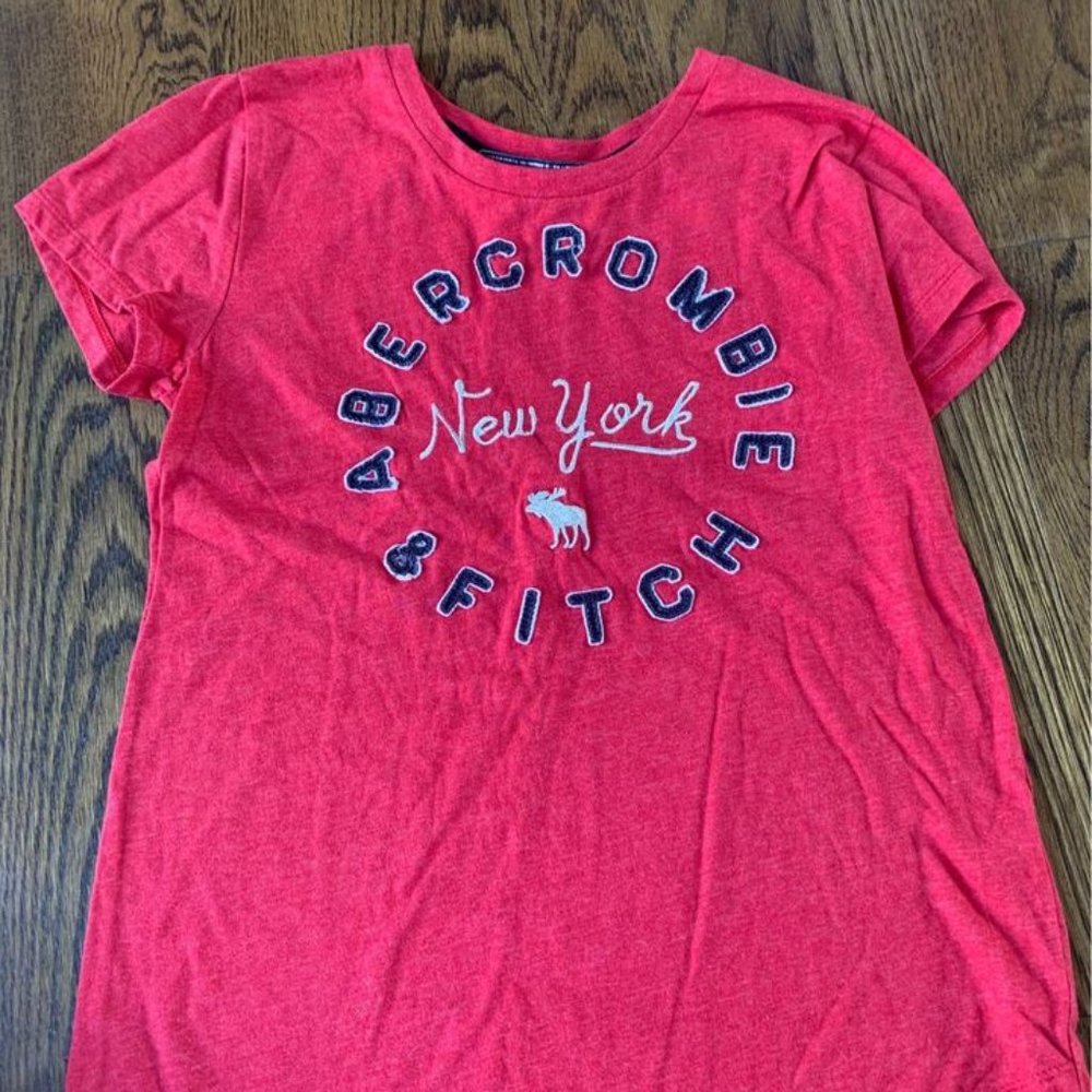 Red Abercrombie shirt.